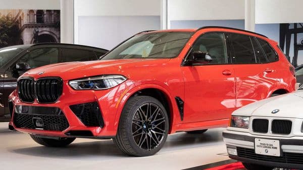The historic vehicle is a Toronto Red Metallic BMW X5 M Competition equipped with a 617-horsepower M TwinPower Turbo V-8 engine.