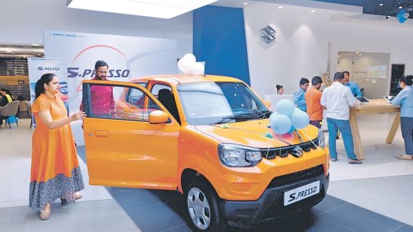 Maruti’s S-Presso—a hatchback crossover—offers more prominent exterior styling and cabin space.ramesh pathania/mint