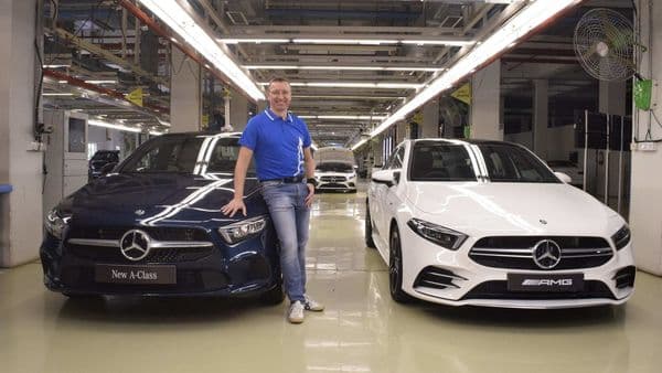 Martin Schwenk, MD and CEO at Mercedes-Benz India, seen here with the A-Class Limousine and the A35 AMG.