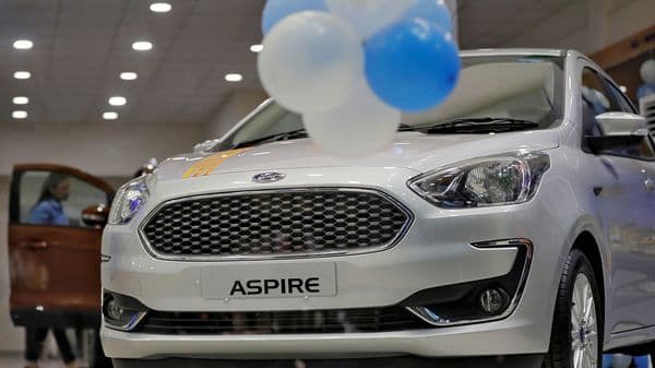 A new Ford Aspire car is on display for sale inside a showroom in New Delhi, India. (File Photo)