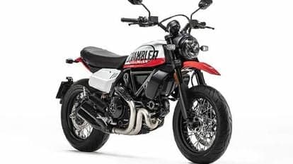 The new Ducati Scrambler 800 Urban Motard gets a Star White Silk with Ducati GP '19 Red and black graphics.
