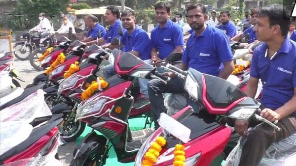 A company in Surat offered 35 electric scooters to its employees as Diwali gifts to beat petrol, diesel price hike blues. (Photo courtesy: Twitter/@ANI)
