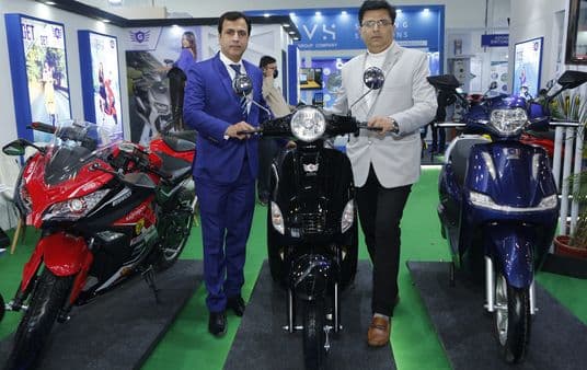 (L-R) Co-founder and CEO at GT-Force, Mukesh Taneja, and Co-founder and COO, Rajesh Saitya posing with electric two-wheelers – GT Drive, GT Drive Pro, and electric motorcycle prototype,&nbsp;