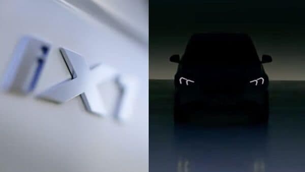 BMW iX1 electric SUV teased ahead of global debut on May 31.