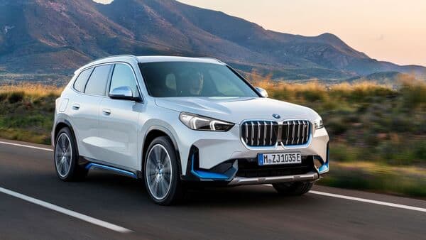 BMW iX1 comes equipped with a 64.7 kWh lithium-ion battery pack. BMW says the electric SUV can offer a range of up to 438 kms on a single charge. It can also support fast charging capacity of up to 130 kW.