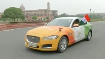 This Jaguar XF has been modified at a cost of  <span class='webrupee'>₹</span>2 lakh to drape it in tricolour by a man from Gujarat to celebrate India's 75th Independence Day.