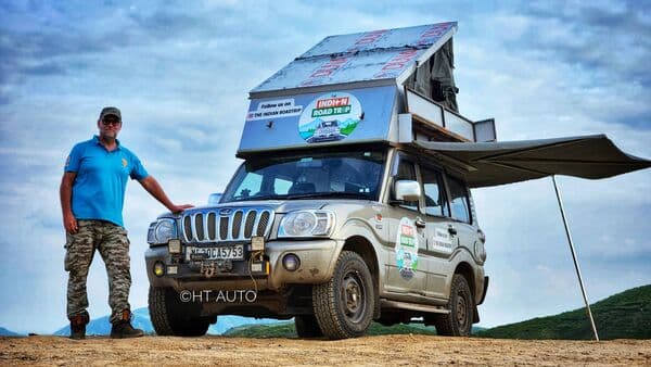 Danny Haberer (left) is seen with his Mahindra Scorpio SUV-turned-motorhome camping at the Rayta Hills near Udaipur, Rajasthan on September 13.