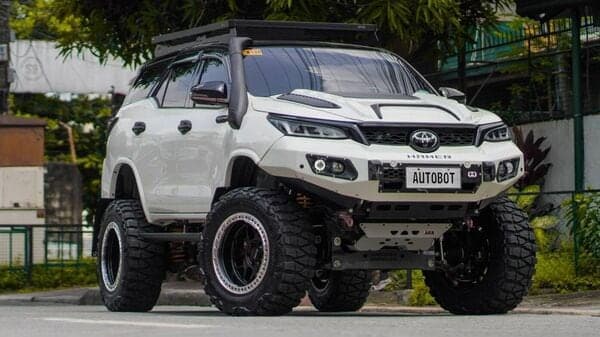 The customised Toyota Fortuner gets a raked suspension and mammoth wheels, resulting in significantly increased suspension. (Image: Facebook/Autobot Offroad PH)