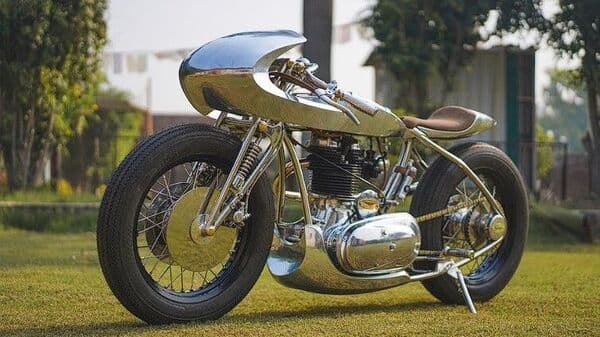 TNT Motorcycles made custom parts for the build. It is based on the Royal Enfield Electra 350 CI.