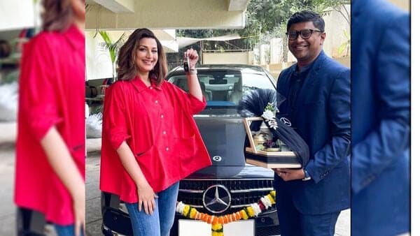 Actor Sonali Bendra receives keys of her new Mercedes-Benz E-Class from a dealer representative