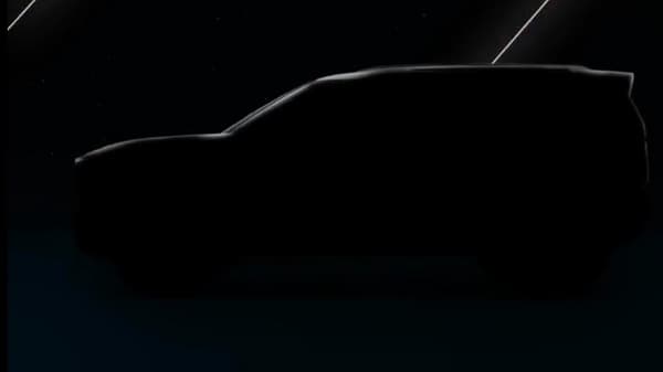 A silhouette of the Tata Safari EV version teased by the carmaker, along with Harrier and Altroz ahead of the Auto Expo 2023.