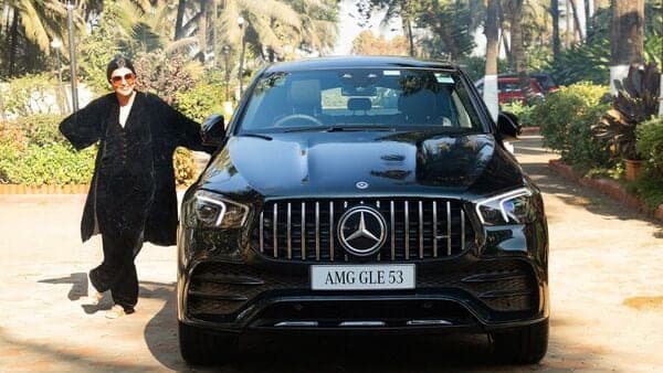 Actor Sushmita Sen poses with her new prized possession the Mercedes AMG GLE 53 coupe SUV 