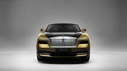 Rolls-Royce Spectre EV has traits of the Wraith with a slim front grille flanked by a split headlight units.