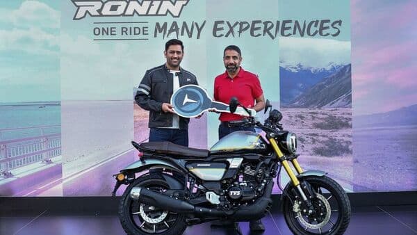 MS Dhoni taking delivery of the TVS Ronin.
