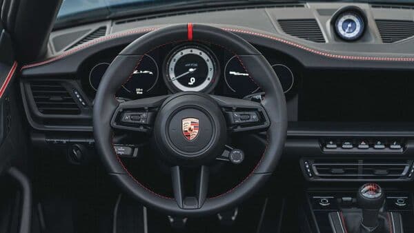 Porsche 911 Carrera GTS Cabriolet America Edition comes with an all-black cabin that gets contrast stitching.