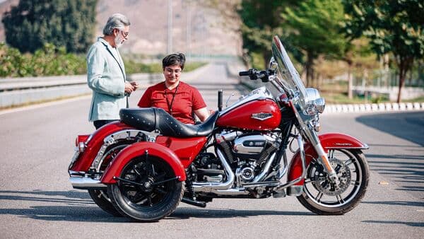 A purpose-built Harley-Davidson Road King presented by Hero MotoCorp to employee Chitra Zutshi.
