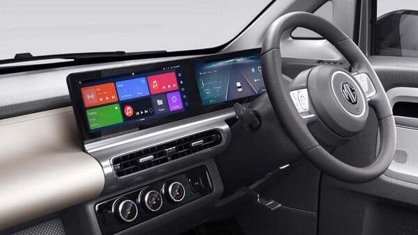 The MG Comet EV's cabin gets two 10.25-inch screens, while the teaser image also shows the iPod-inspired multi-function steering wheel