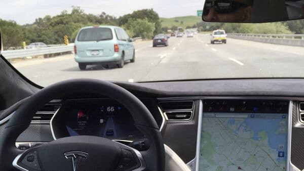Tesla's advanced in-car driver monitoring system can now track metrics like yawns and eye blinks to ensure the driver is not drowsy.