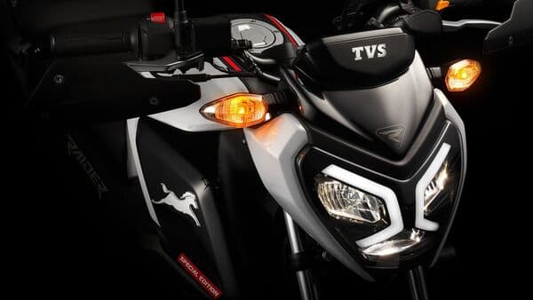 The TVS Raider 125 Racing Special Edition gets a new California Gray paint scheme with red pinstripes