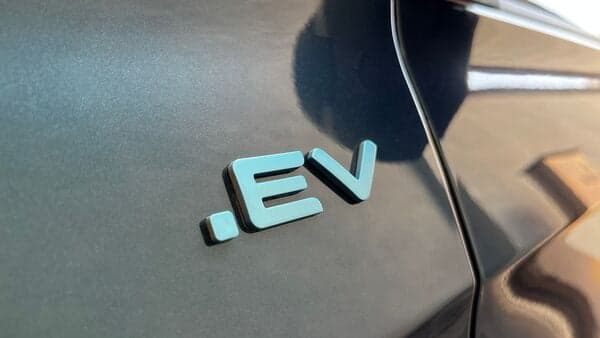 File photo of the EV lettering on a Tata Tiago EV vehicle.