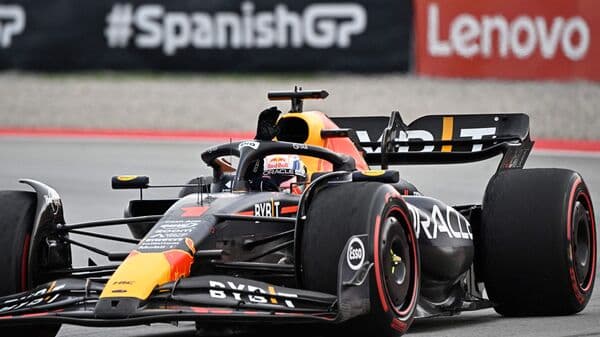 Red Bull's Dutch driver Max Verstappen waves after winning the Spanish Formula One Grand Prix race on June 4, 2023.