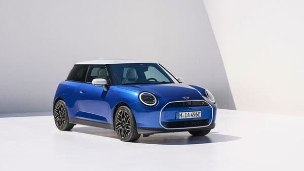 The new MINI Cooper EV adopts a minimal exterior and interior design for a powerful presence. 