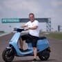 MotoGP Bharat 2023: Former world champion Loris Capriossi takes Ola electric scooter for a spin on BIC tracks