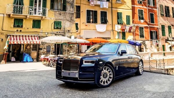 The exterior of the Rolls-Royce Phantom Cinque Terre is finished in a deep, rich Ligurian blue, which is further accentuated with a hand-applied double coachline in Navy Blue and Jasmine, completed with grapes motif.