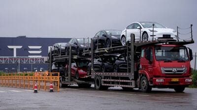File photo: A truck transports new Tesla cars at its factory in Shanghai, China. Image has been used for representational purpose.