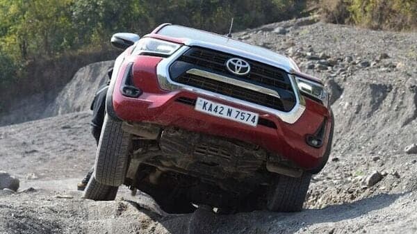 The Toyota Hilux has a high ground clearance. While this helps the vehicle on treacherous roads, it also means getting in and out is a tough ask.