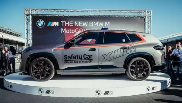 The safety car version of the BMW XM Label Red gets a special body wrap and new Recaro racing seats with six-point harnesses.