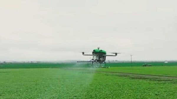 An electric aerial vehicles or EAV in action on a farmland in California.