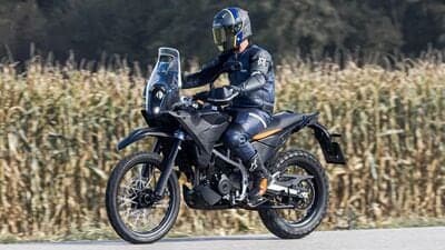 The 2025 KTM 390 Adventure test mule reveals a slimmer, more Dakar Rally-inspired motorcycle with possibly a 21-inch front wheel