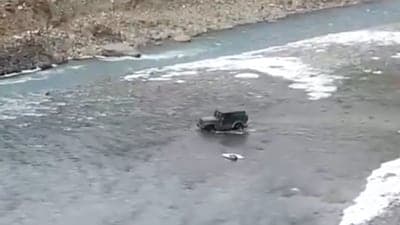 Screengrab from the video of a Mahindra Thar SUV being driven on Chandra river in Sissu, Himachal Pradesh. The state police has issued challan against the SUV owner for violating traffic rules after the video went viral.