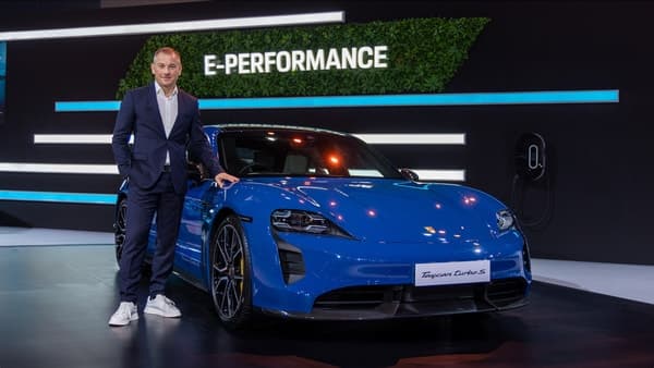 Manolito Vujicic, Brand Director of Porsche India, seen posing with the Taycan Turbo S model at an event in Mumbai.