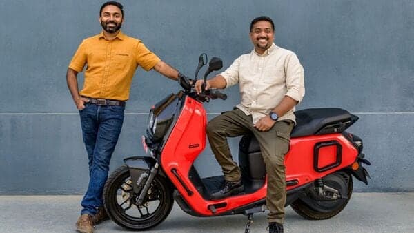 River co-founders Aravind Mani and Vipin George with the Indie electric scooter