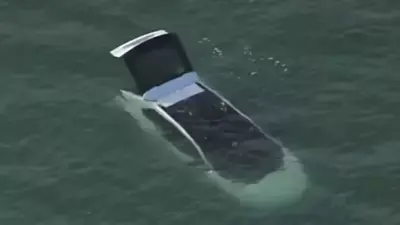 A Toyota bZ4X electric crossover ended up in the ocean as its driver forgot to put the car in park mode. (Image: NBC10)