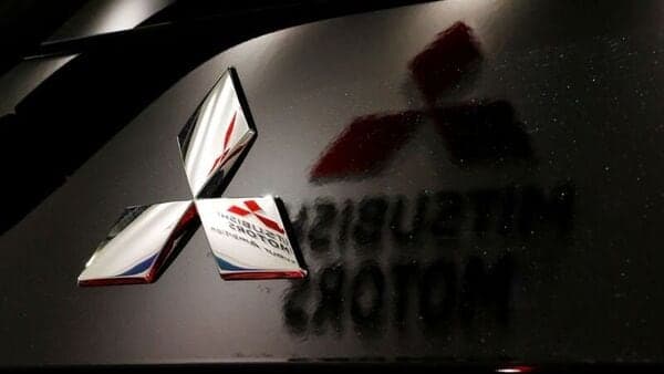 Logo of Mitsubishi Motors Corp are seen at a showroom of the company's headquarters in Tokyo, Japan.