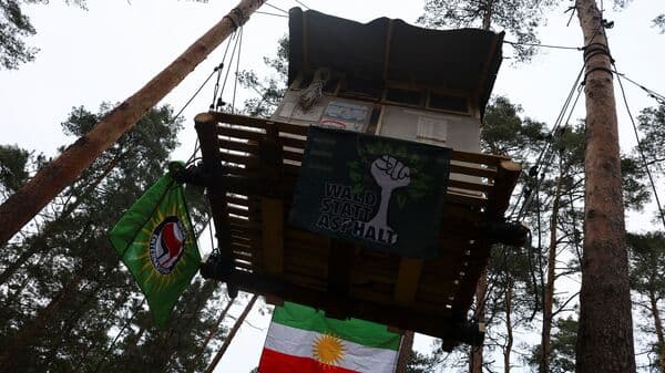 Locals protest Tesla plant expansion plans in Germany, set up tree houses for fight
