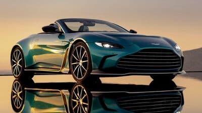 Aston Martin has decided to continue manufacturing petrol cars as long as it can after the carmaker delayed the arrival of its first ever electric vehicle. 