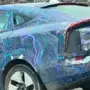 Mahindra XUV.e9 spied testing with electrifying camouflage, launch in April 2025