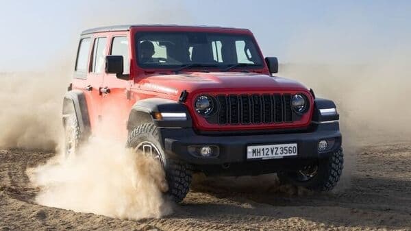 The 2024 Jeep Wrangler SUV draws power from a 2.0-litre turbocharged petrol engine mated to an eight-speed torque converter automatic gearbox.
