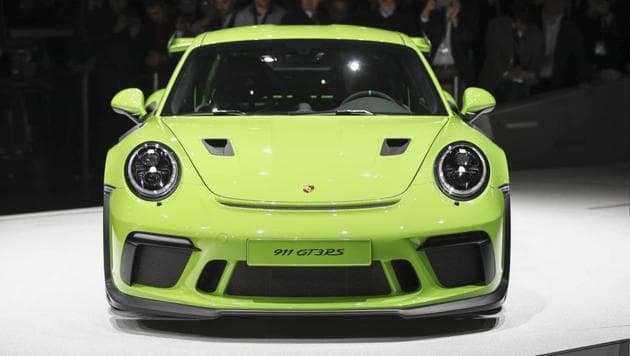 The Porsche 991 GT3 RS automobile sits on display on the opening day of the 88th Geneva International Motor Show in Geneva on March 6, 2018.